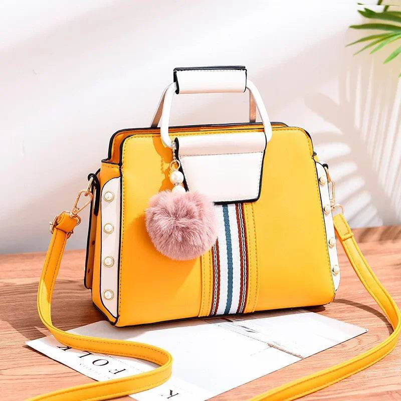 Bolso doble color con pompón - Kamivashop