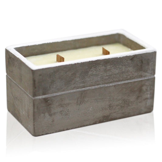 Rectangular concrete candle holder with white wax and two wooden wicks