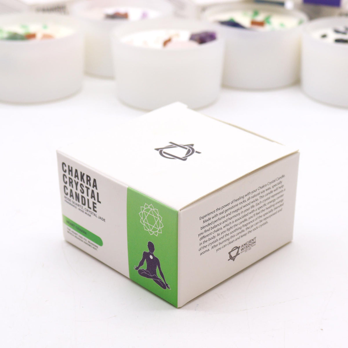 Chakra Crystal Candle packaging box with a meditation icon and descriptive text.